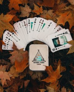 deck of cards in leaves