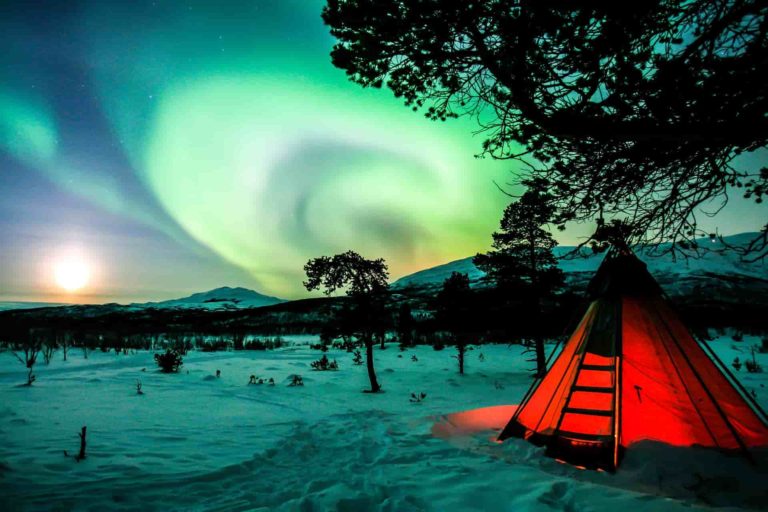 winter camping tent in snow