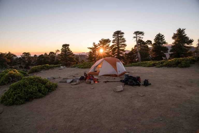 camping tent on dirt hill