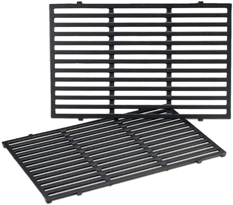 a cast iron grill grate with white background