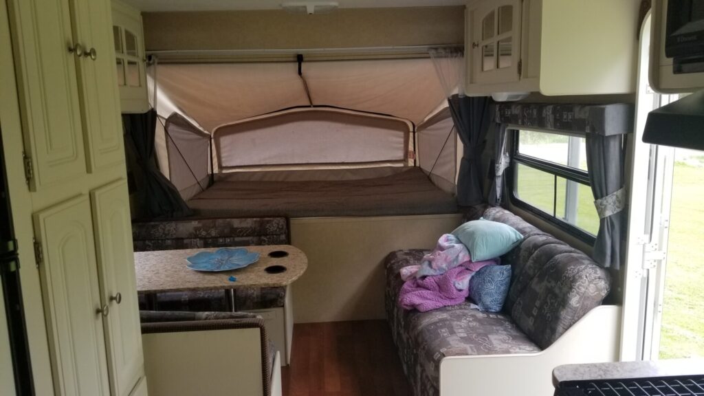 Hybrid camp trailer couch and bed